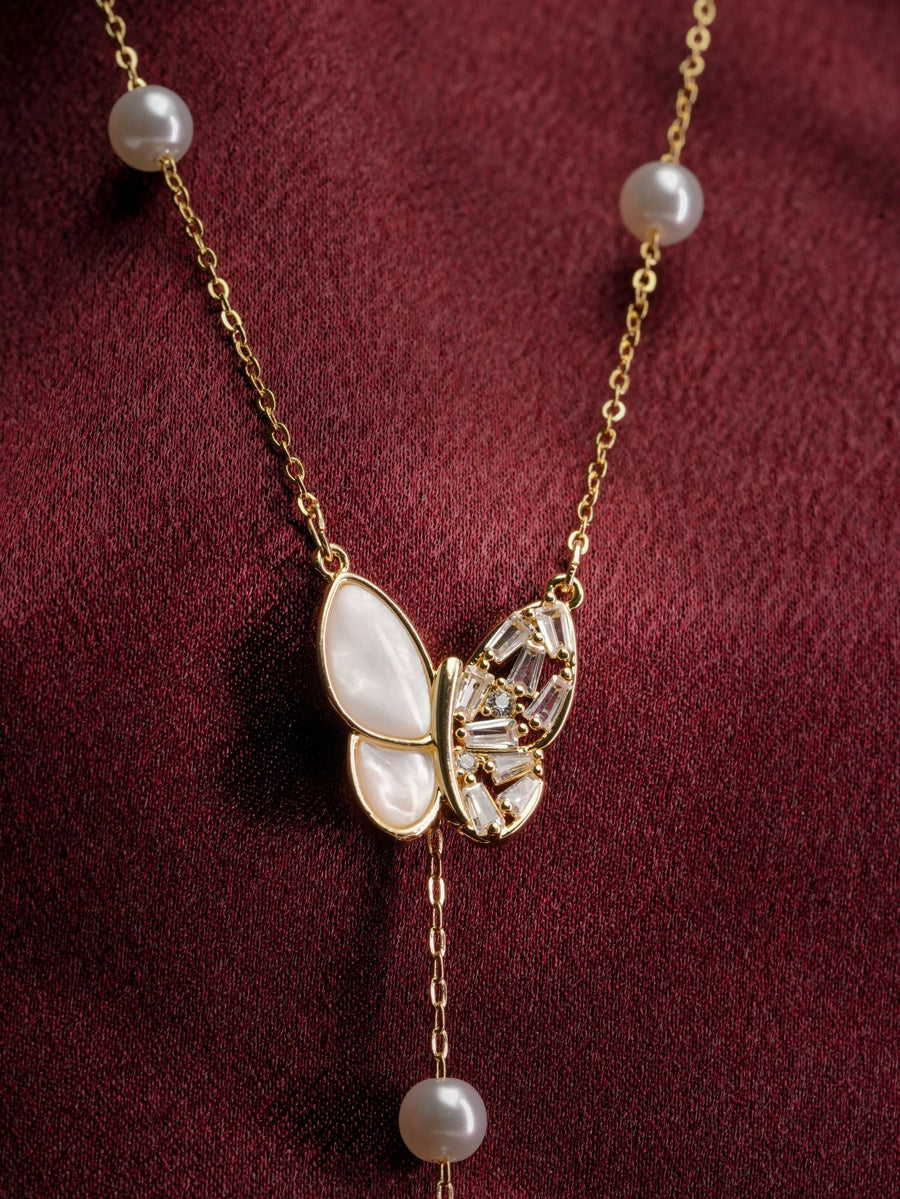 Ashborne Pearl Butterfly Lariat — studio photo
