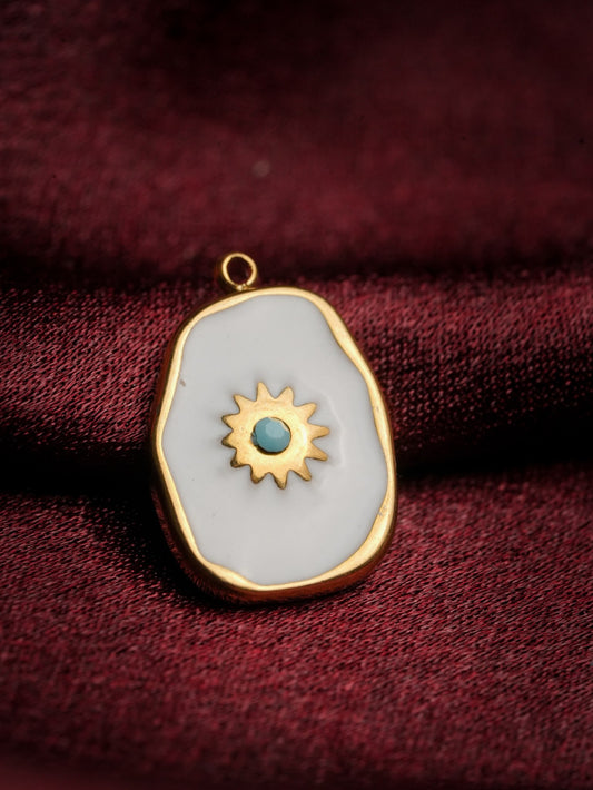 Ashborne Sanya freeform white enamel pendant with a gold sunburst and turquoise centre bead