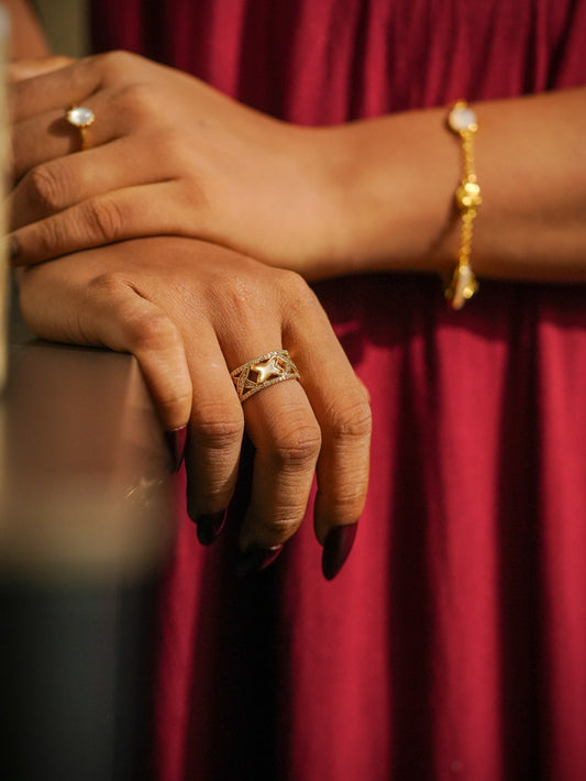 Ashborne Avani gold-tone crisscross ring with mother-of-pearl star and pavé crystal