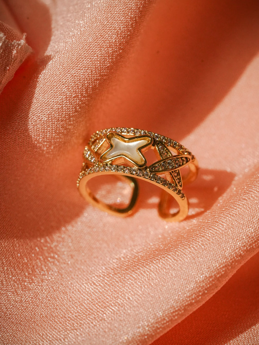 Ashborne Avani mother-of-pearl star ring worn, close detail