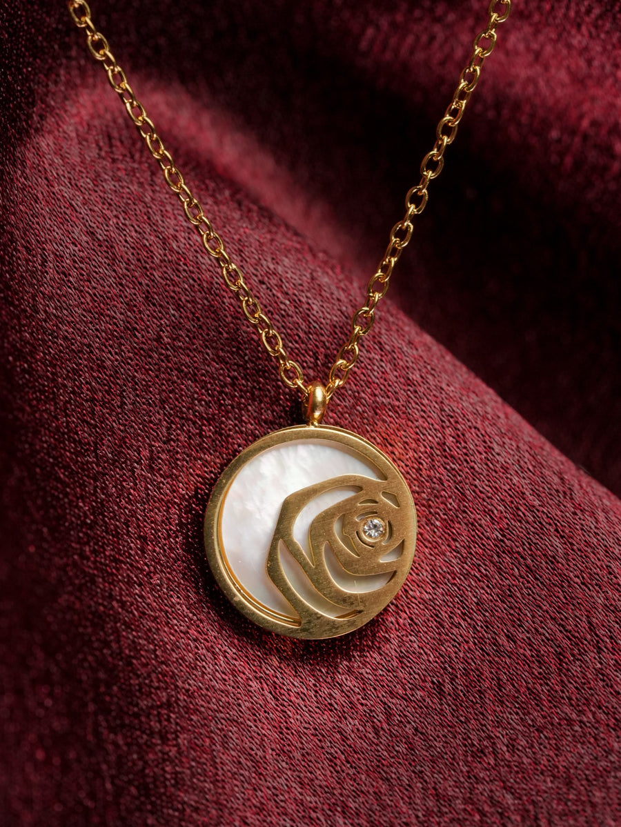 Ashborne Nila rose pendant, openwork gold rose over mother-of-pearl disc on fine chain