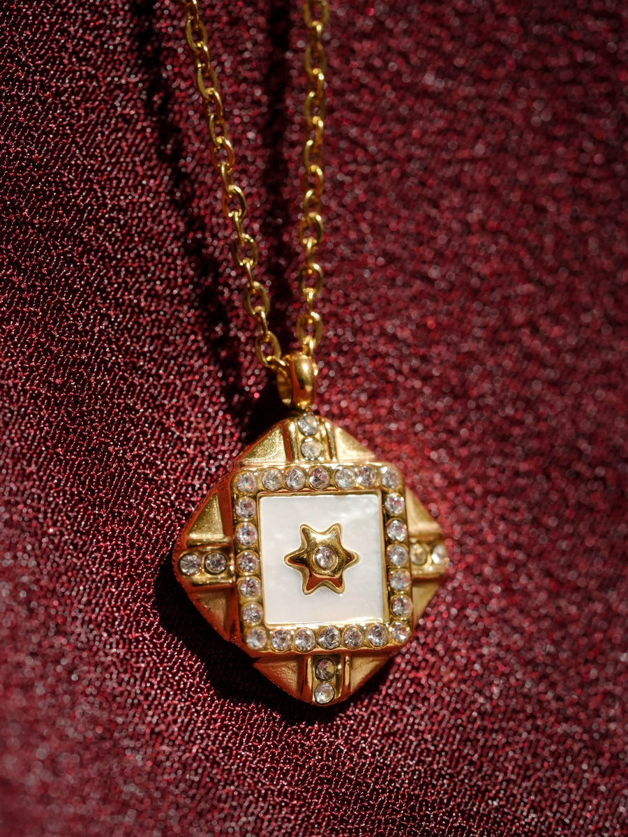 Ashborne Meera gold-tone diamond pendant with mother-of-pearl centre, star and pavé crystal border
