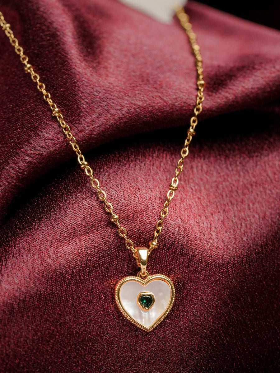 Ashborne Namrata heart mother-of-pearl pendant with green heart-cut centre stone