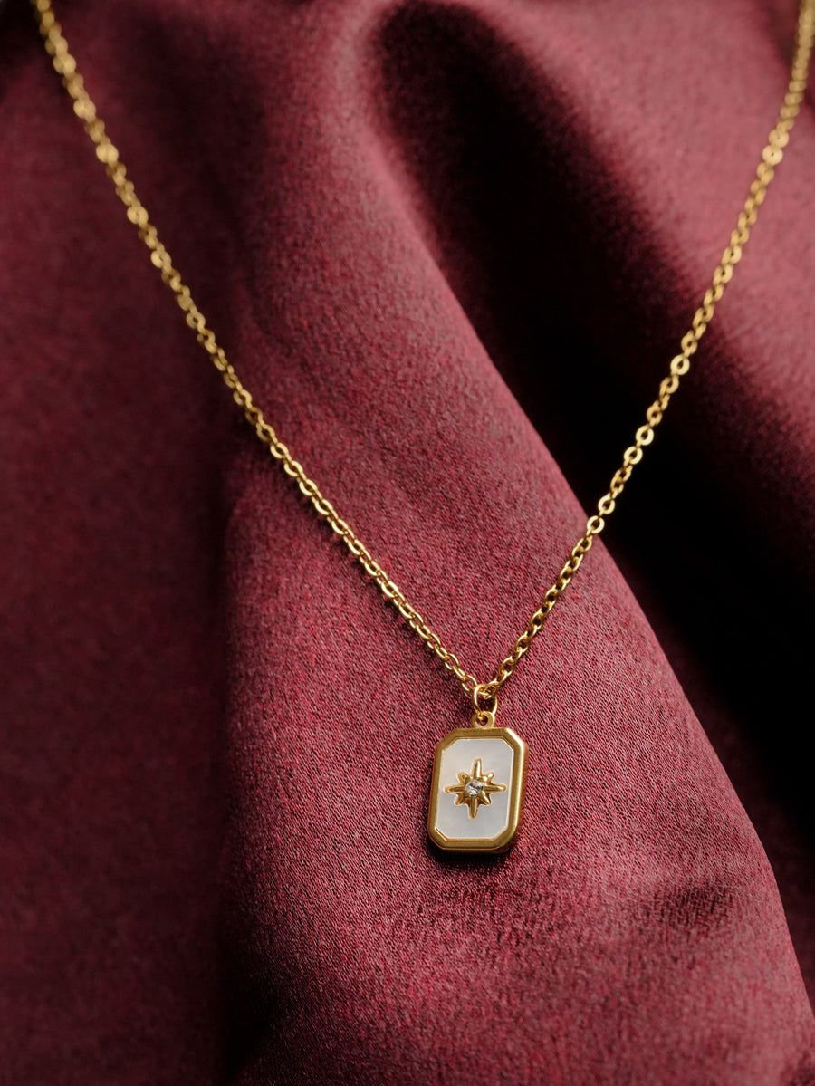 Ashborne Ojaswini star-compass mother-of-pearl tag necklace on a fine gold chain