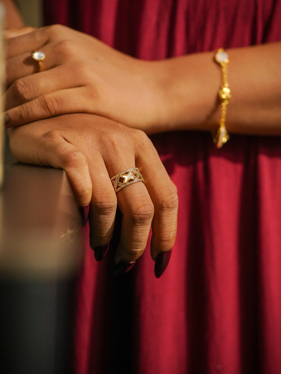 Ashborne Avani gold-tone crisscross ring with mother-of-pearl star and pavé crystal