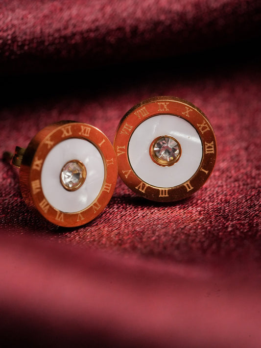 Ashborne Pooja roman-numeral clock-face stud earrings with mother-of-pearl centre and crystal