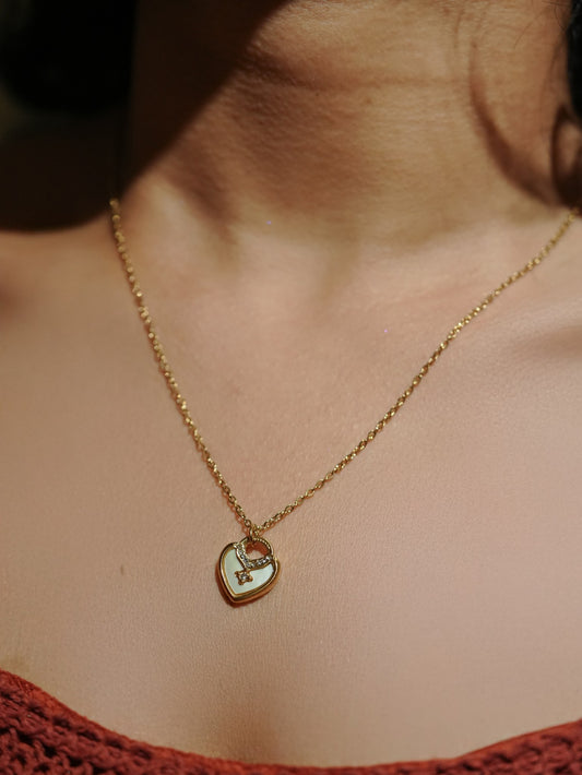 Ashborne Komal gold-tone mother-of-pearl heart pendant with crystal accent, worn