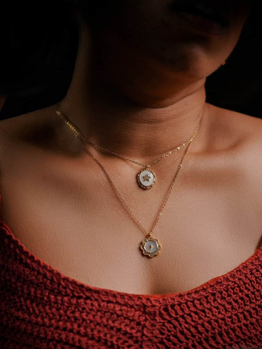 Ashborne Kashvi layered star and floral mother-of-pearl pendant set worn on the neck