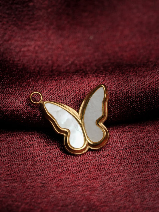 Ashborne Saanvi mother-of-pearl butterfly pendant with gold outline on maroon velvet